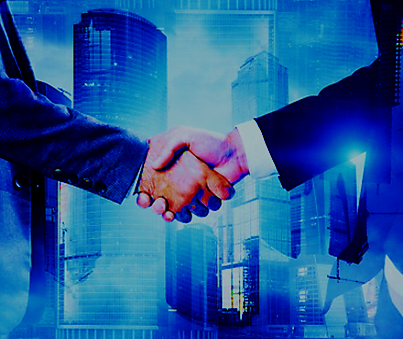 Two people wearing business suits shaking hands