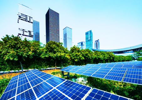A view of solar panels and tall buildings